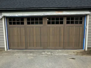 Garage door painting completed with a smooth, even exterior finish